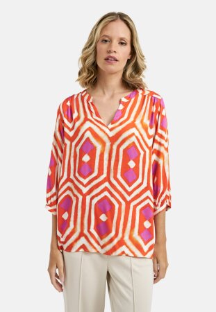 BLOUSE WITH GATHERING AND STAND UP