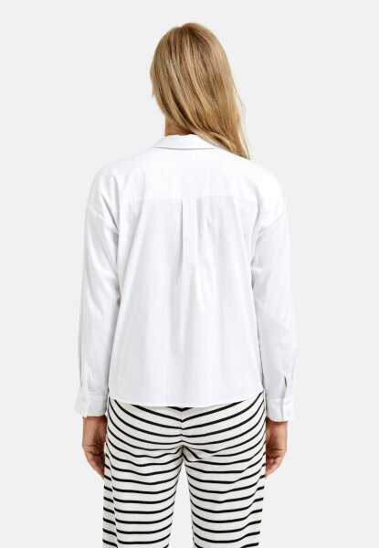 OVERLAPPING POCKET BLOUSE